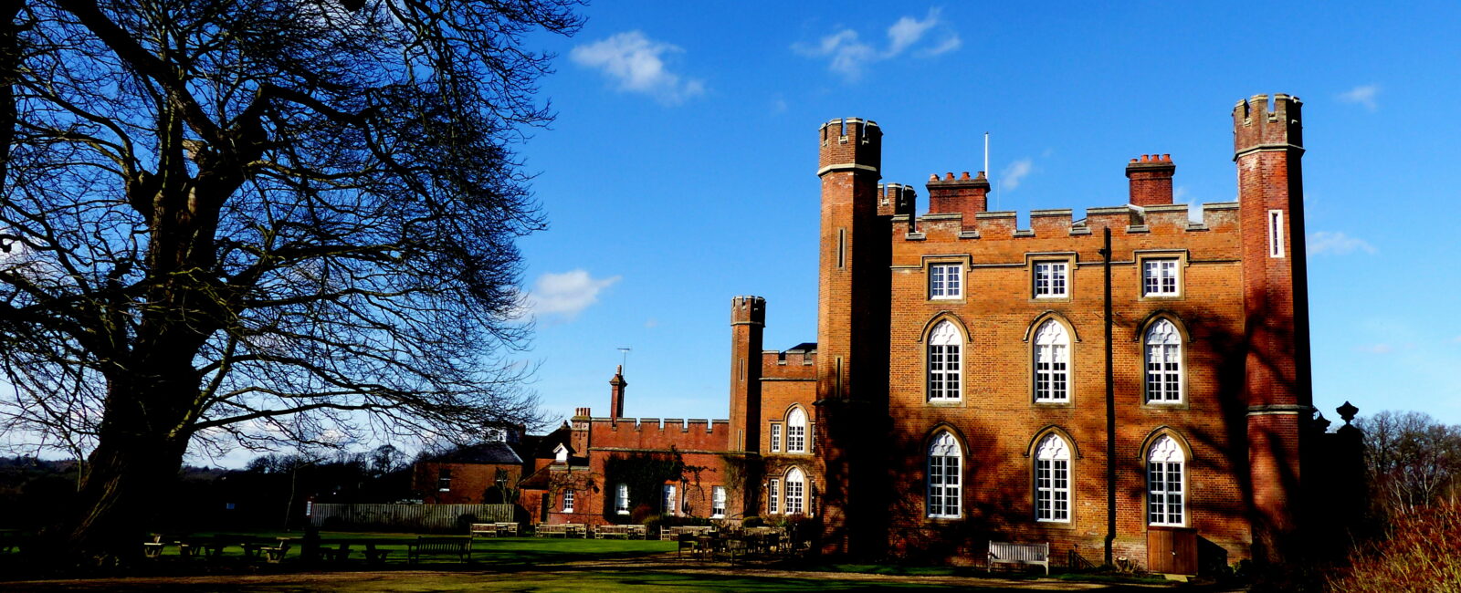 Side view of Cumberland Lodge in winter, from the grounds