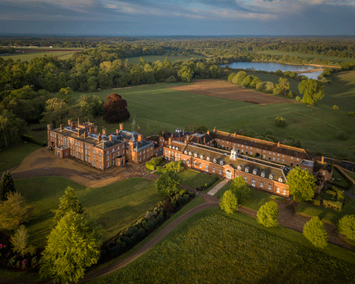 Aerial view of Cumberland Lodge in Windsor Great Park, at dawn
