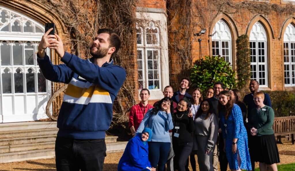 The Cumberland Lodge Fellows take a selfie in the Cumberland Lodge Gardens