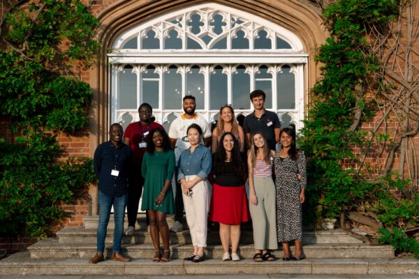 Our 10 new Cumberland Lodge Fellows standing outside the Tapestry Hall door.