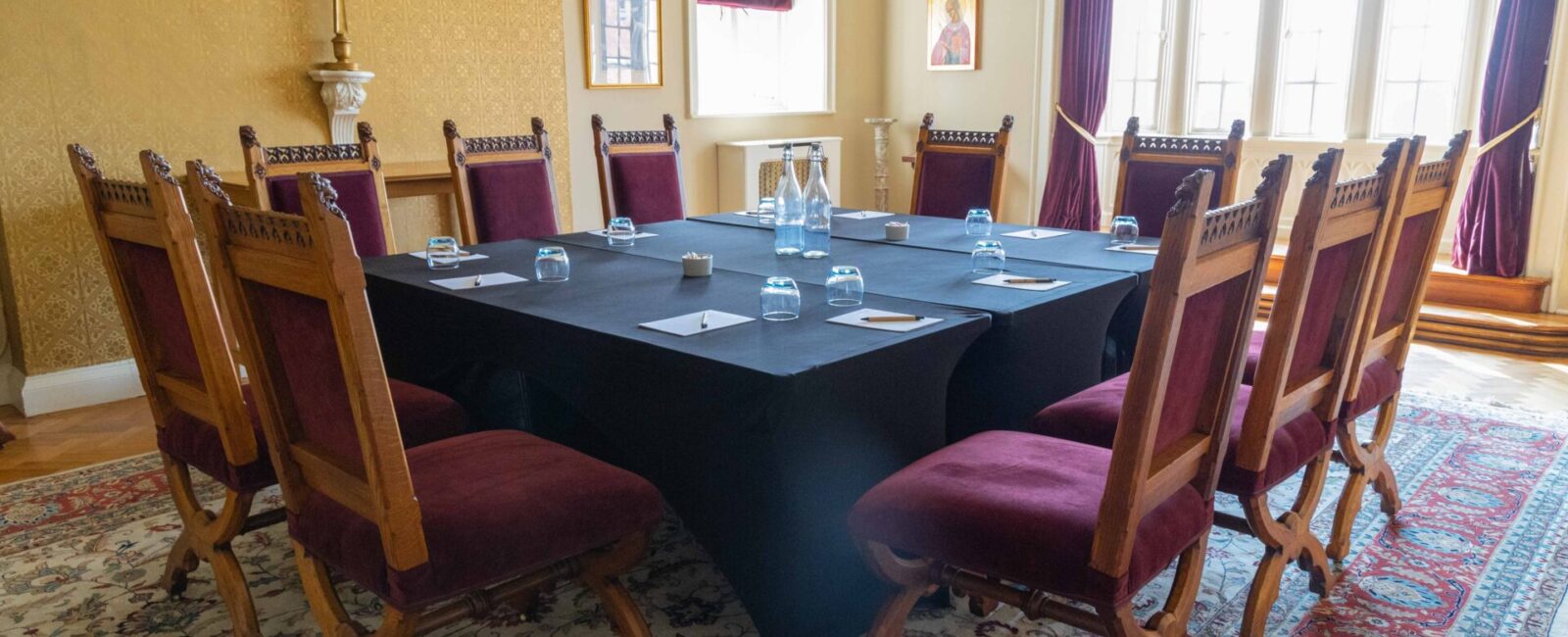 The Cumberland Lodge Chapel set up to seat 10 in a boardroom style