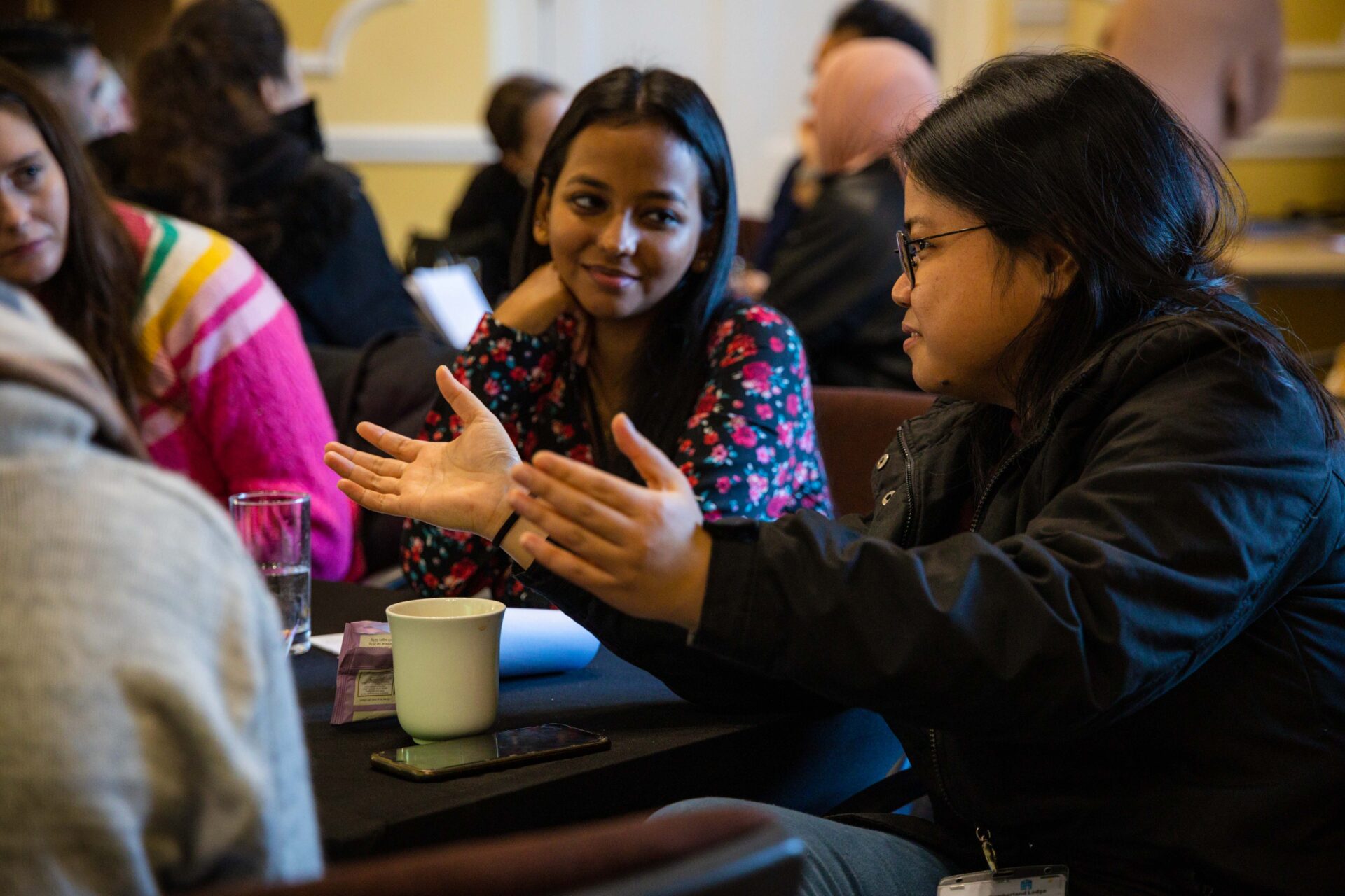 Students taking part in a group discussion.