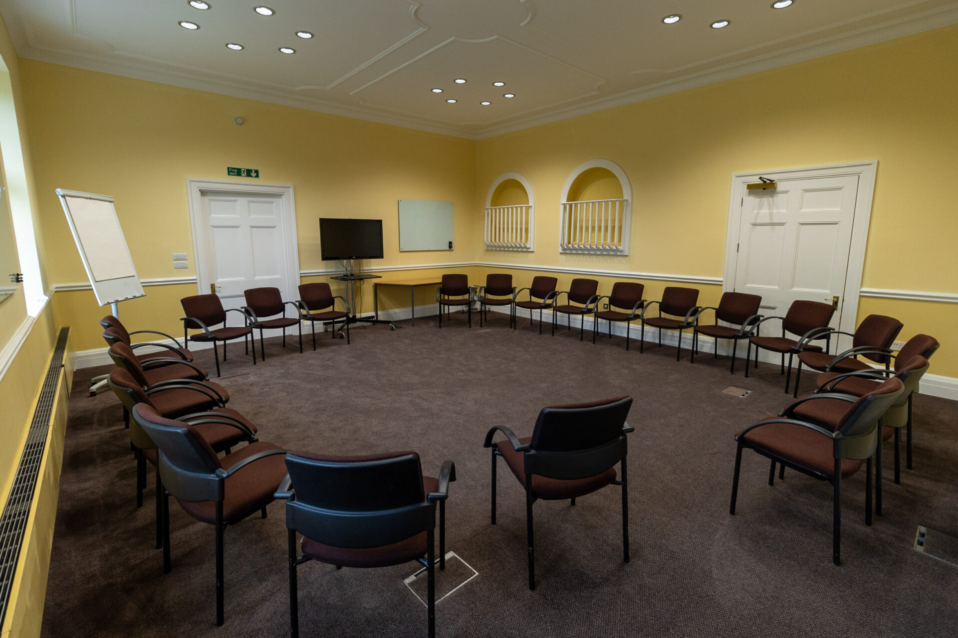 The Greening conference room, laid out in a circle to accommodate up to 22 people.