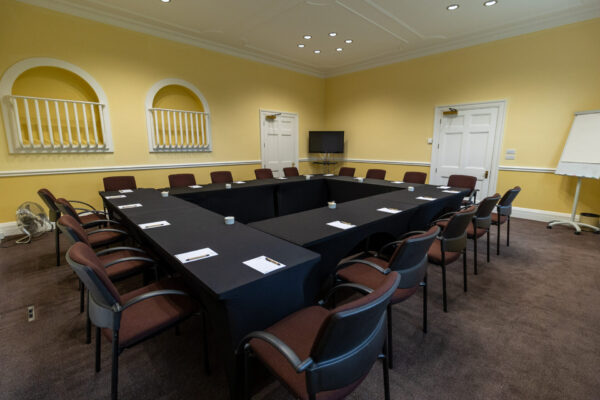 The Greening conference room, laid out in a boardroom style to accommodate up to 18 people.