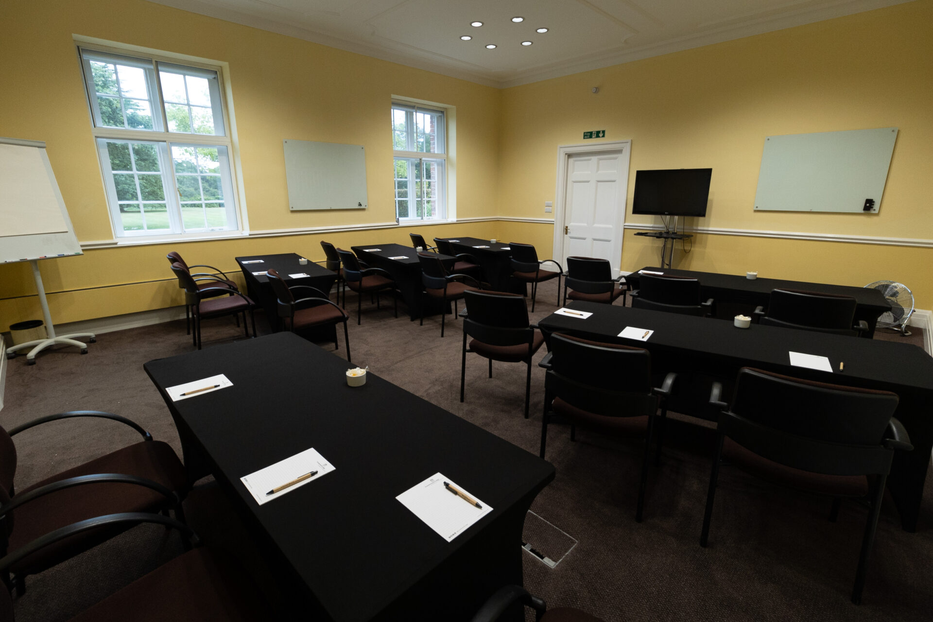 The Greening conference room, laid out in a cabaret style to accommodate up to 18 people.
