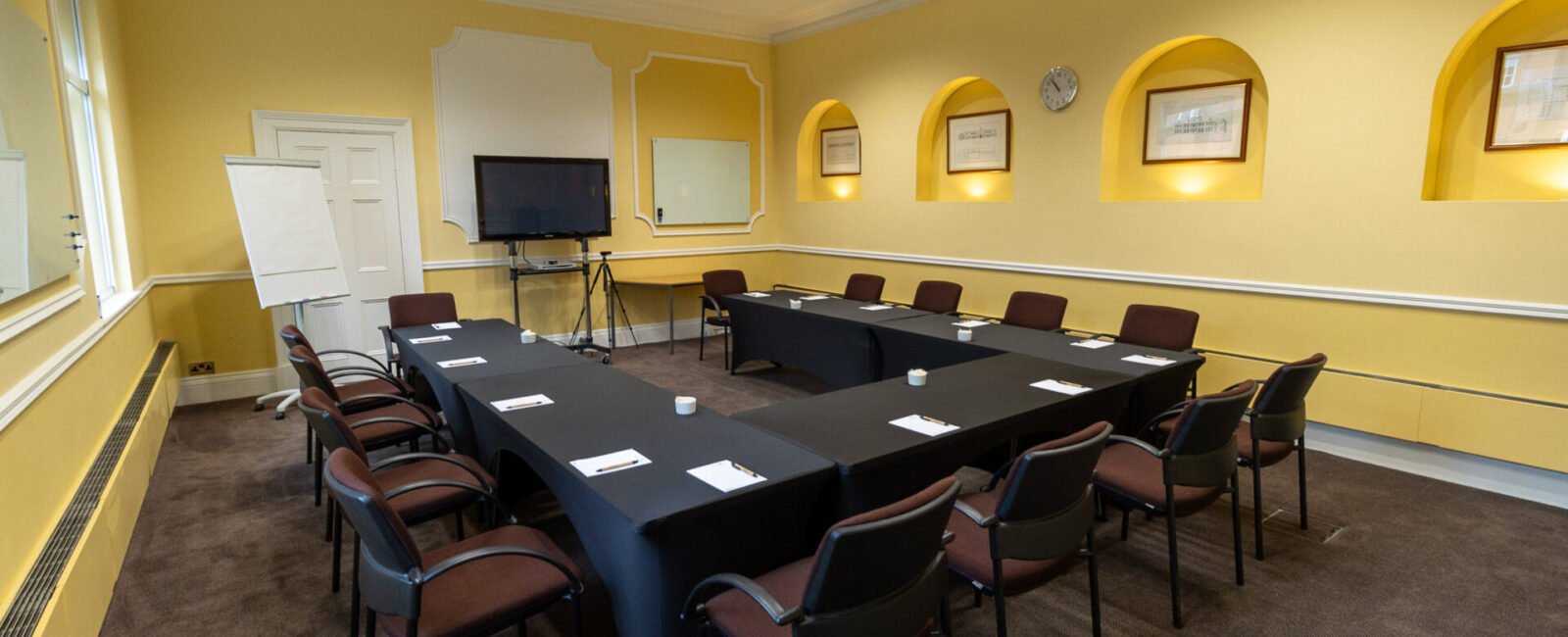 The Hodgson conference room, laid out as a U-shape boardroom to accommodate up to 14 people.
