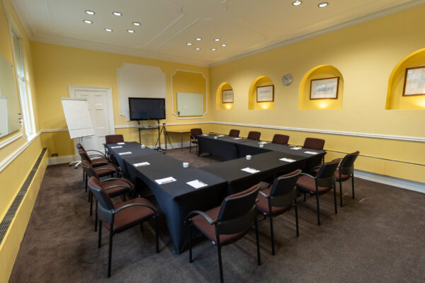 The Hodgson conference room, laid out as a U-shape boardroom to accommodate up to 14 people.