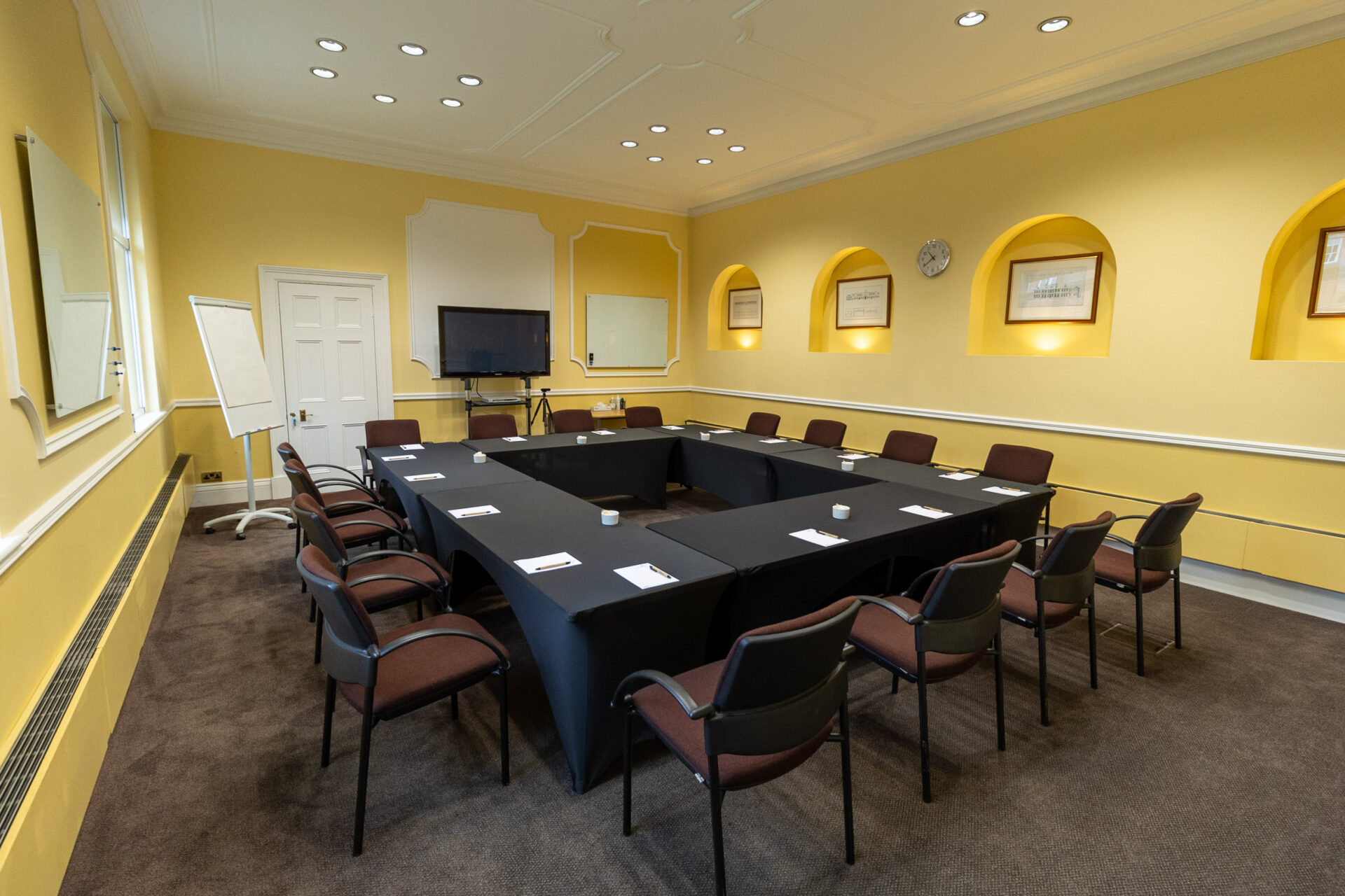 The Hodgson conference room, laid out as a boardroom to accommodate up to 16 people.