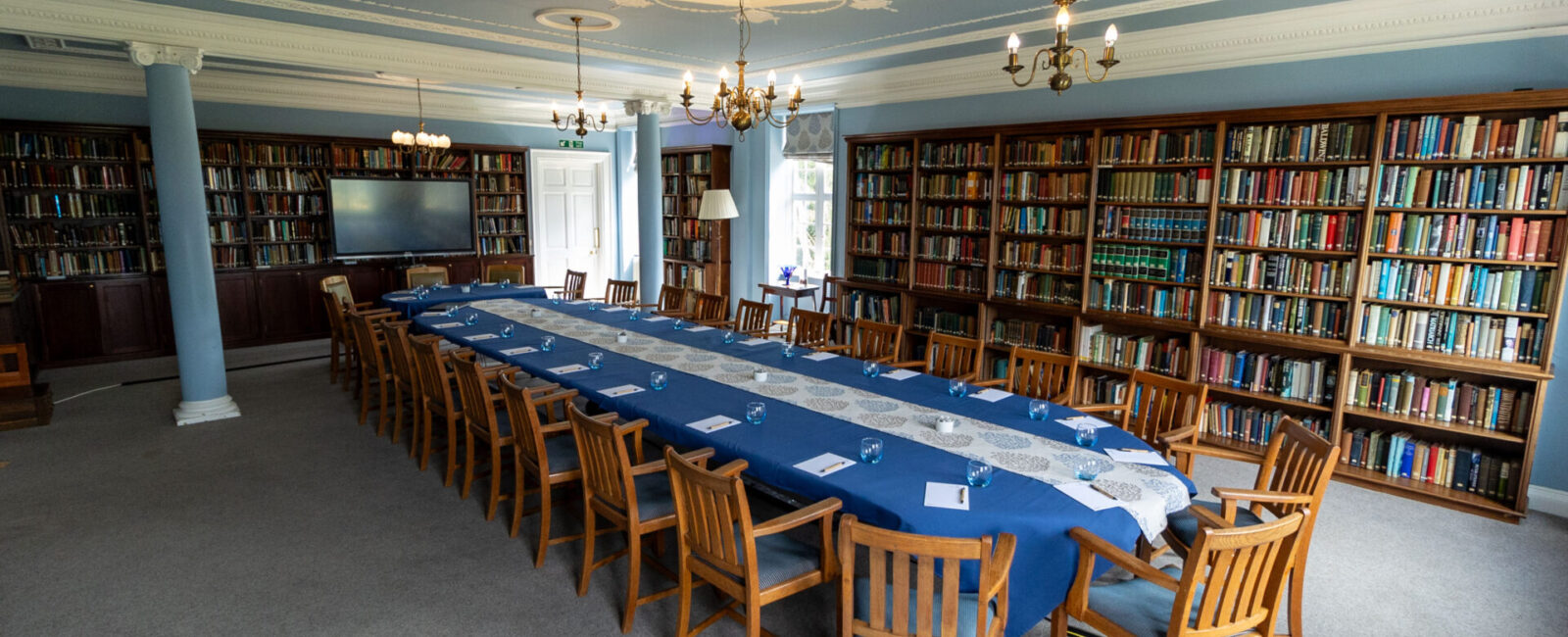 The Amy Buller Library in Cumberland Lodge, set up to accommodate 25 guests