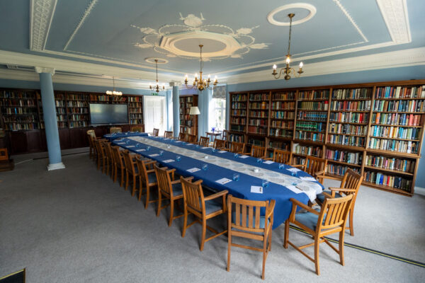 The Amy Buller Library in Cumberland Lodge, set up to accommodate 25 guests