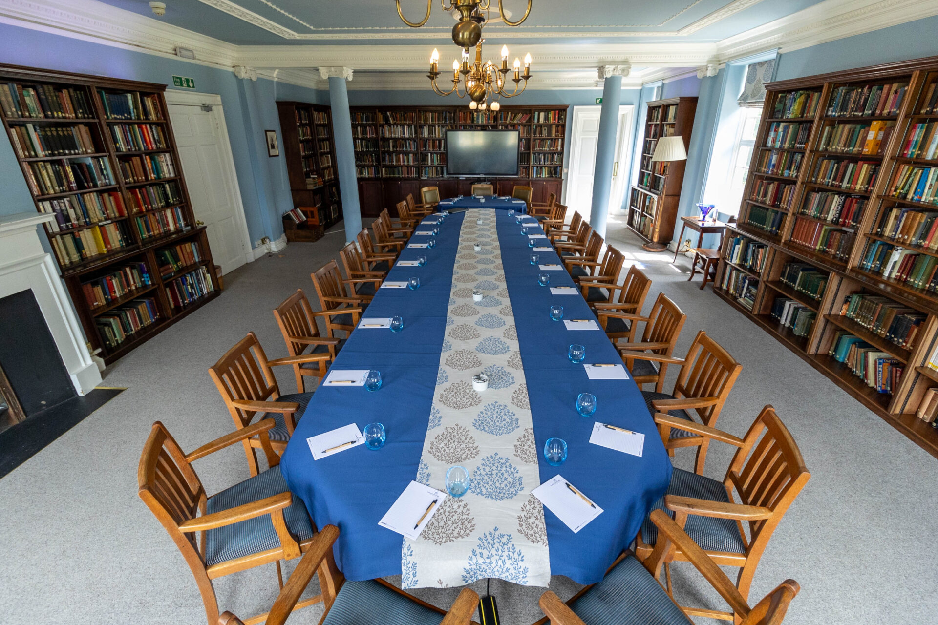 The Amy Buller Library in Cumberland Lodge, set up to accommodate 25 guests