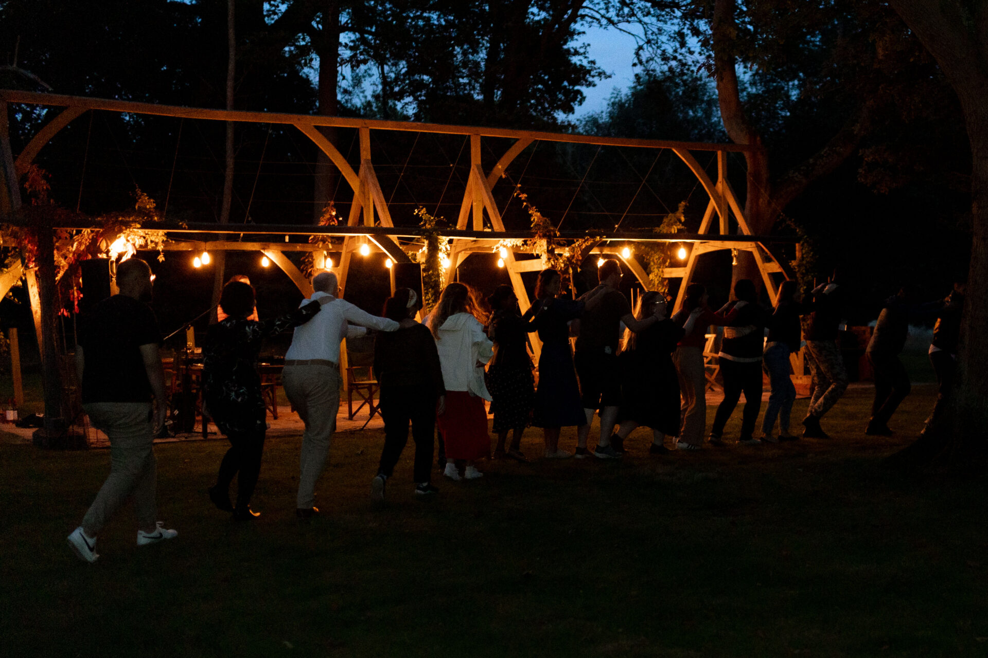 A conga line in the gardens of Cumberland Lodge.