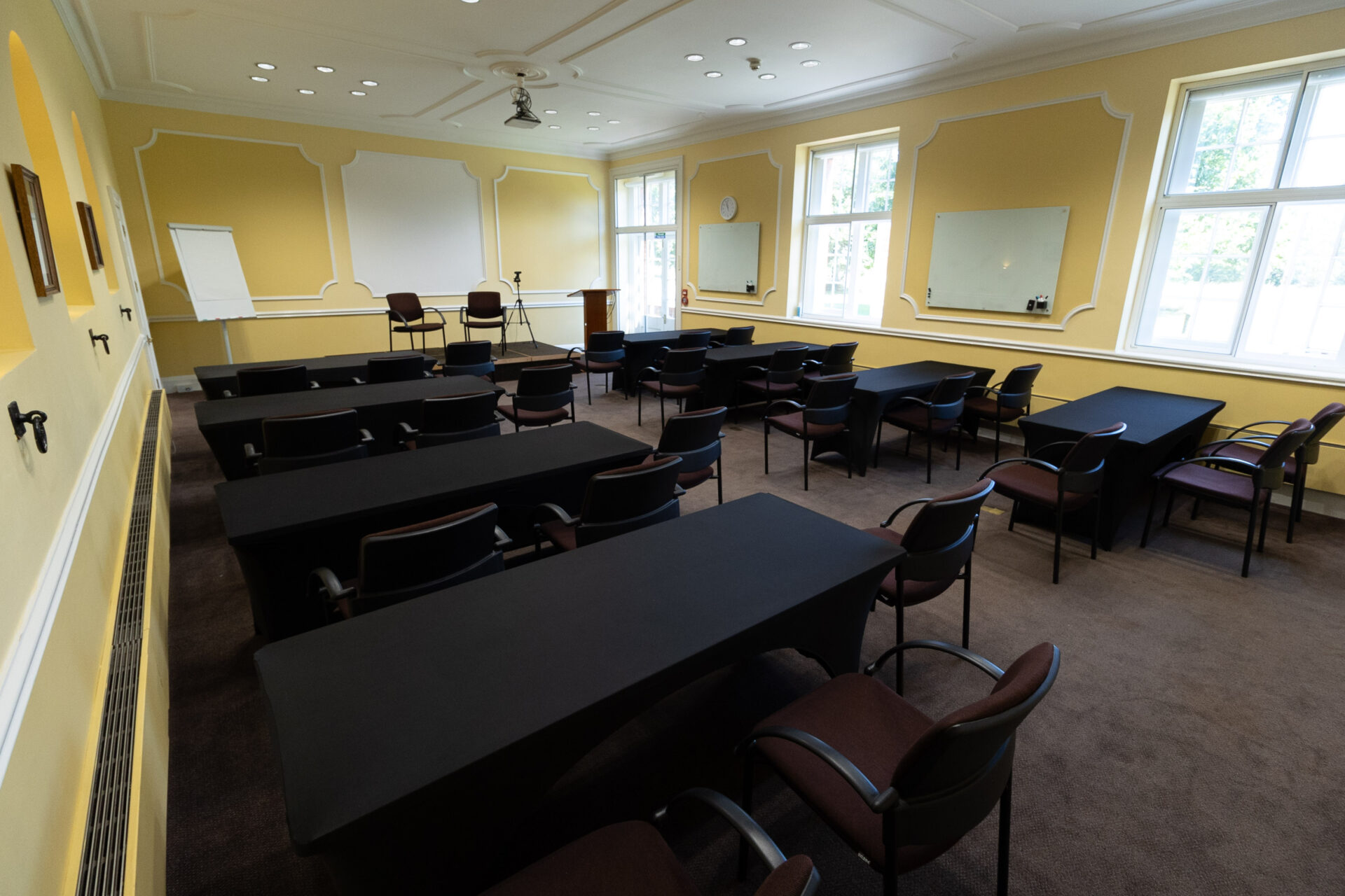 The Sandby conference room, set up in a classroom layout to accommodate up to 24 people.
