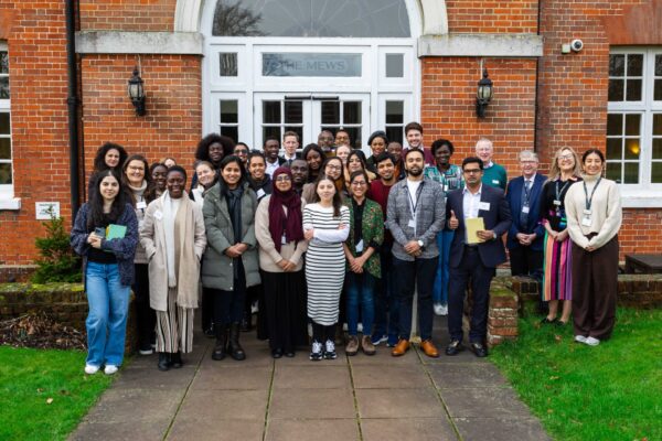 The first cohort of the Strengthening Rule of Law programme, outside The Mews building at their first retreat