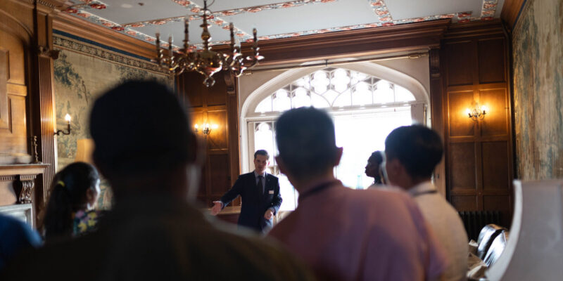 Students listening to a man give a speach at the Life Beyond the PHD conference