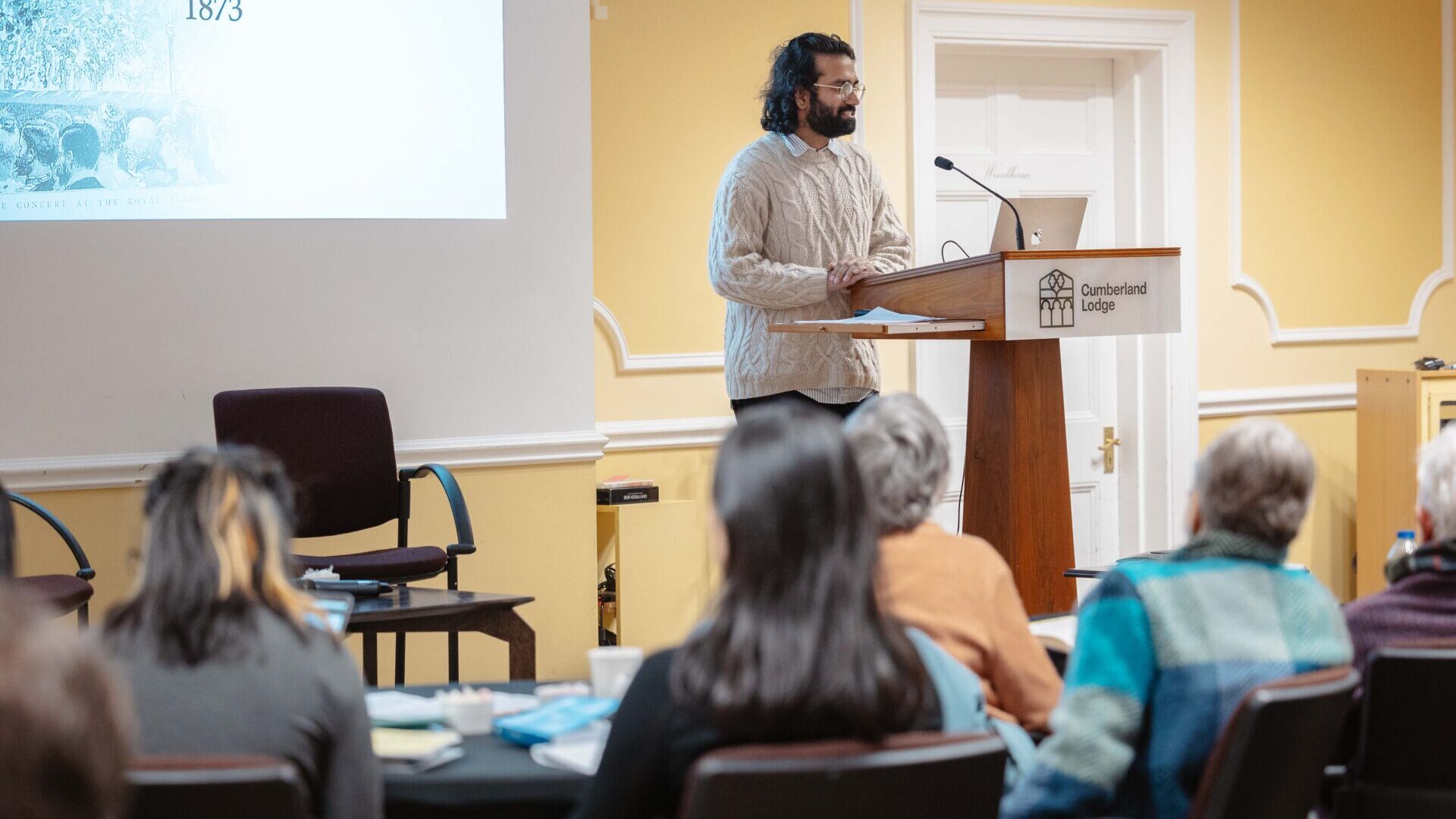Ankur Desval Fehrani speaking at the 2025 Shakespeare Reading Retreat