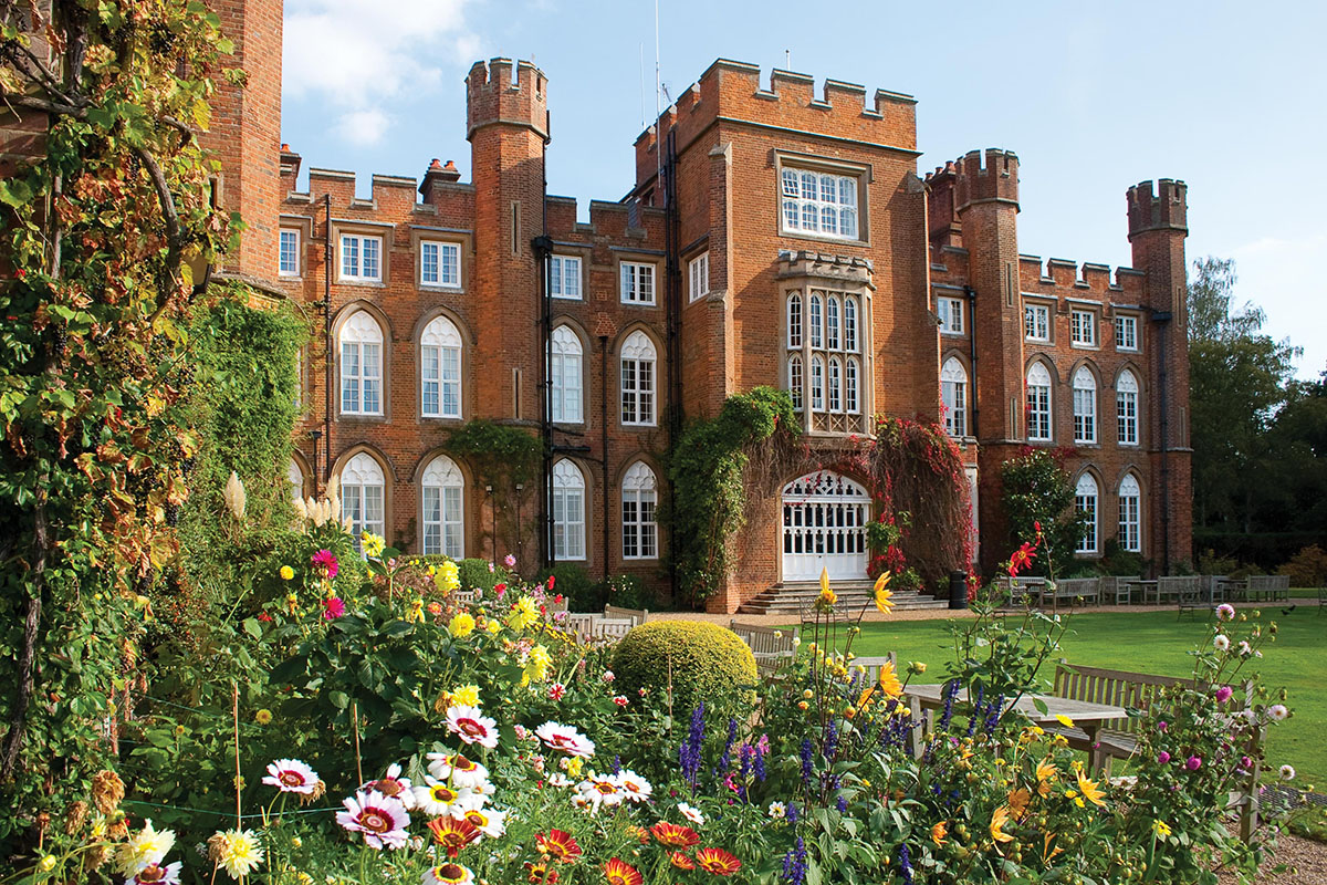 View of Cumberland Lodge with flowers in the foreground