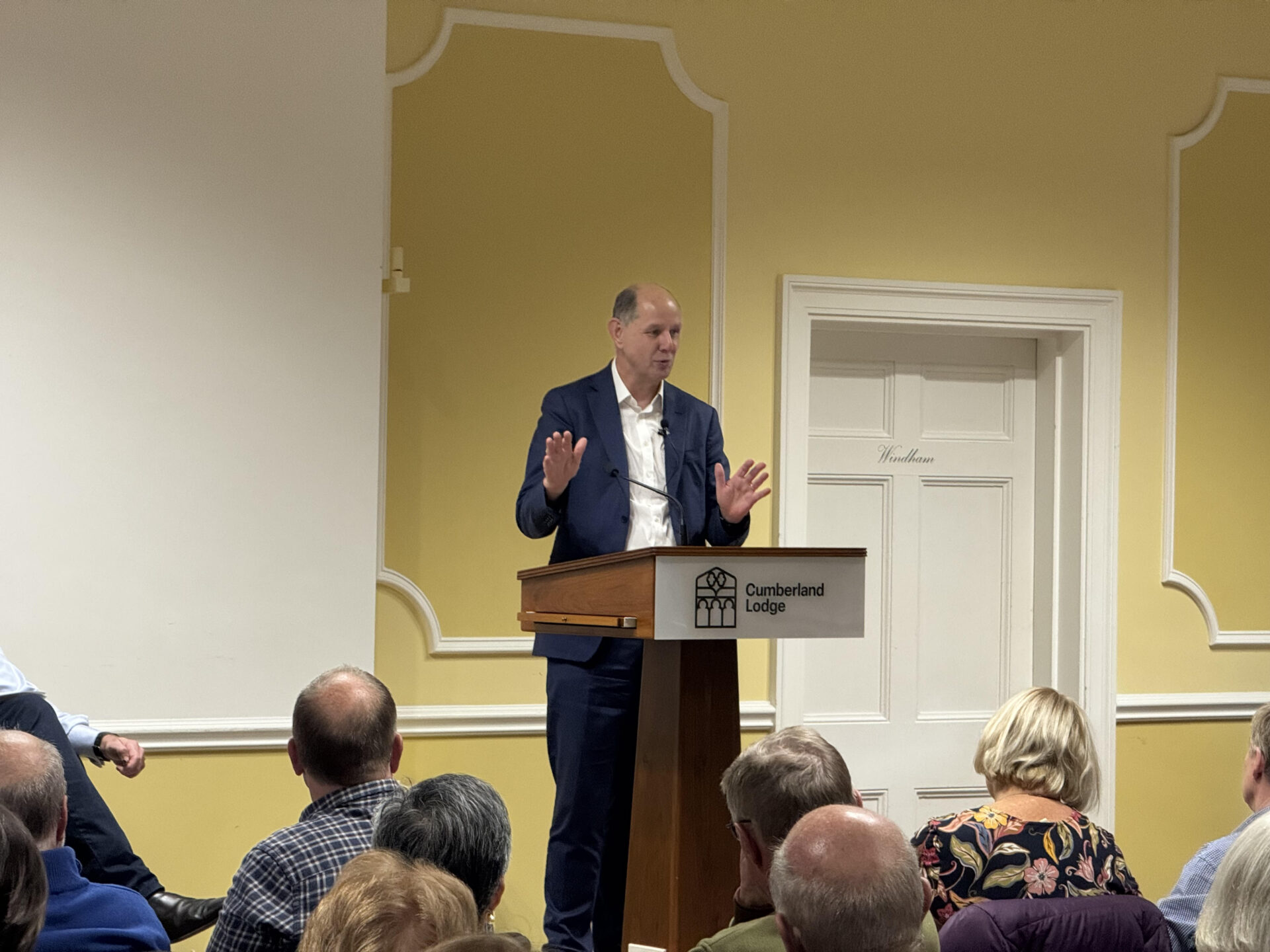 An Image of Sire Philip Barton speaking at Cumberland Lodge